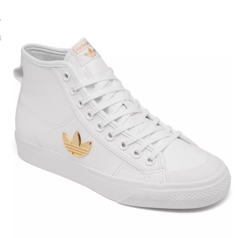 adidas Nizza Trefoil Hi
Cloud White Gold Metallic